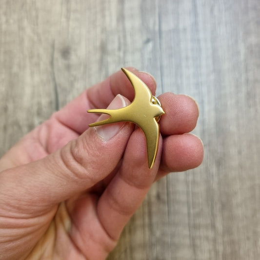 Pin's hirondelle doré — Poussière des rues , Lyon