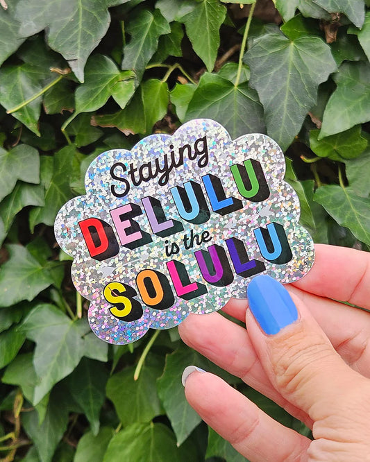 Sticker pailleté Staying delulu is the solulu